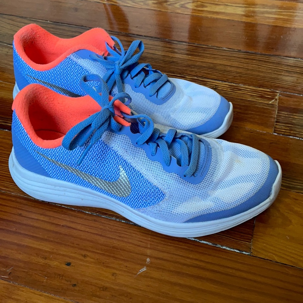 Light blue kids Nike sneakers